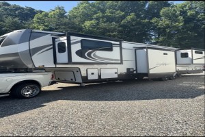 Pre-owned 2022 Forest River Sandpiper 391FLRB Fifth Wheel